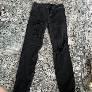 Black distressed skinny jeans